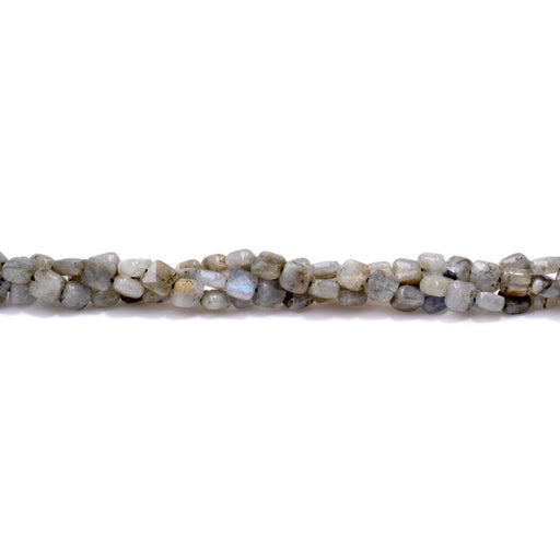 This is a Dakota Stones 6mm Labradorite Gemstone strand with faceted square beads in 15-16 inch strand.
