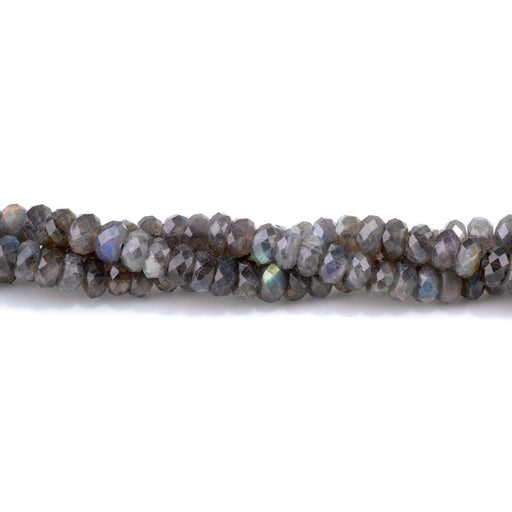 This is a Dakota Stones 6x10mm Dark Labradorite Gemstone strand with AAA grade faceted rondelle beads in 15-16 inch strand.