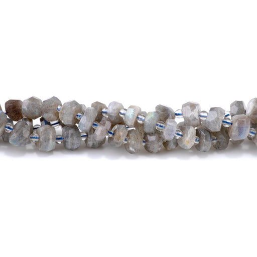 This is a Dakota Stones 6x10mm Labradorite Irr Gemstone strand with faceted rondelle beads in 15-16 inch strand.