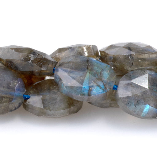 This is a Dakota Stones 8x10mm Labradorite Triangle Cut Puff Gemstone strand with A grade faceted oval beads in 15-16 inch strand.