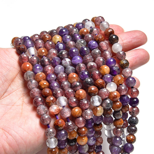 This is a Dakota Stones 8mm Mixed Dark Lepidocrocite Large Hole Gemstone strand with faceted round beads in 8 inch strand.