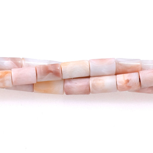 This is a Dakota Stones 3x5mm Lions Paw Light Orange White Gemstone strand of round beads in 15-16 inch strand.
