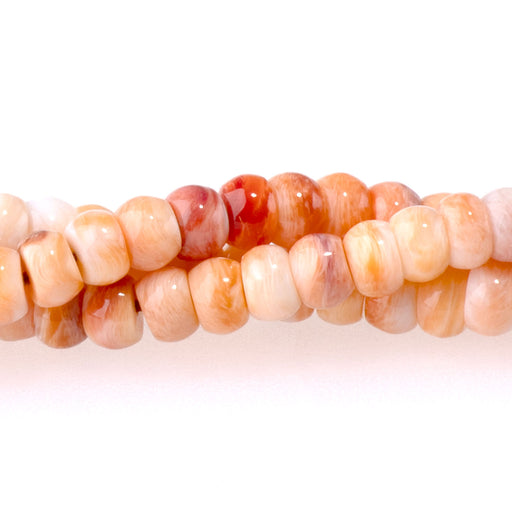 This is a Dakota Stones 4mm Lions Paw Light Orange Gemstone strand with rondelle beads in 15-16 inch strand.