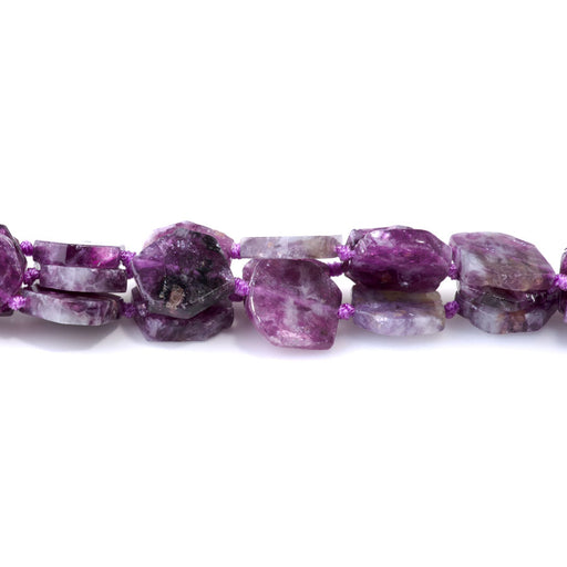 This is a Dakota Stones 12-18mm Lepidolite Quartz Flat Hexagon Gemstone strand with free-form beads in 15-16 inch strand.