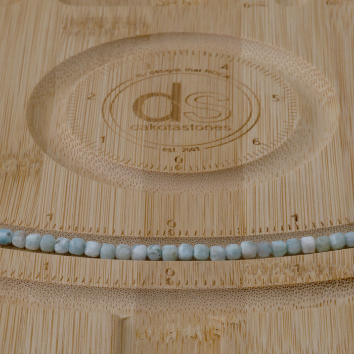 This is a Dakota Stones 3mm Larimar Gemstone strand with A grade faceted cube beads in 15-16 inch strand.