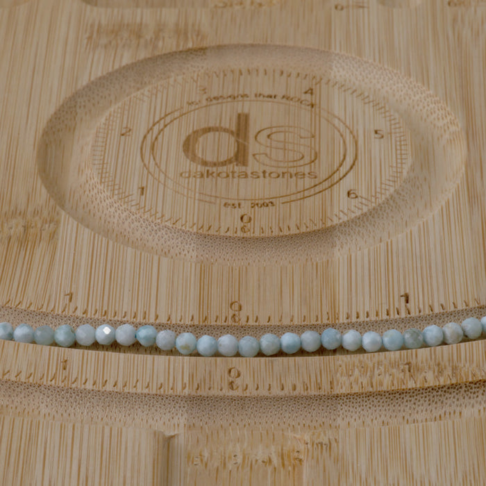 This is a Dakota Stones 3mm Larimar Gemstone strand with A grade faceted round beads in 15-16 inch strand.