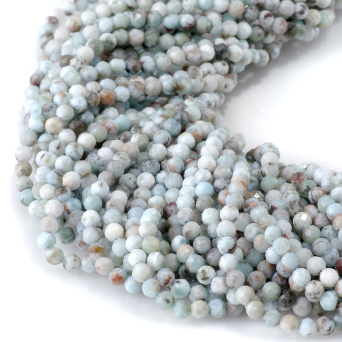 This is a Dakota Stones 3mm Larimar Matrix Gemstone strand with faceted round beads in 15-16 inch strand.