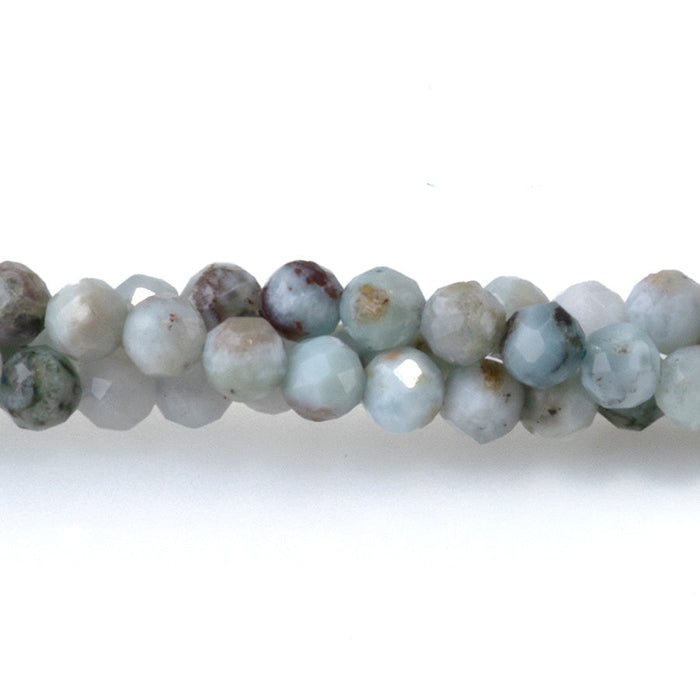 This is a Dakota Stones 3mm Larimar Matrix Gemstone strand with faceted round beads in 15-16 inch strand.