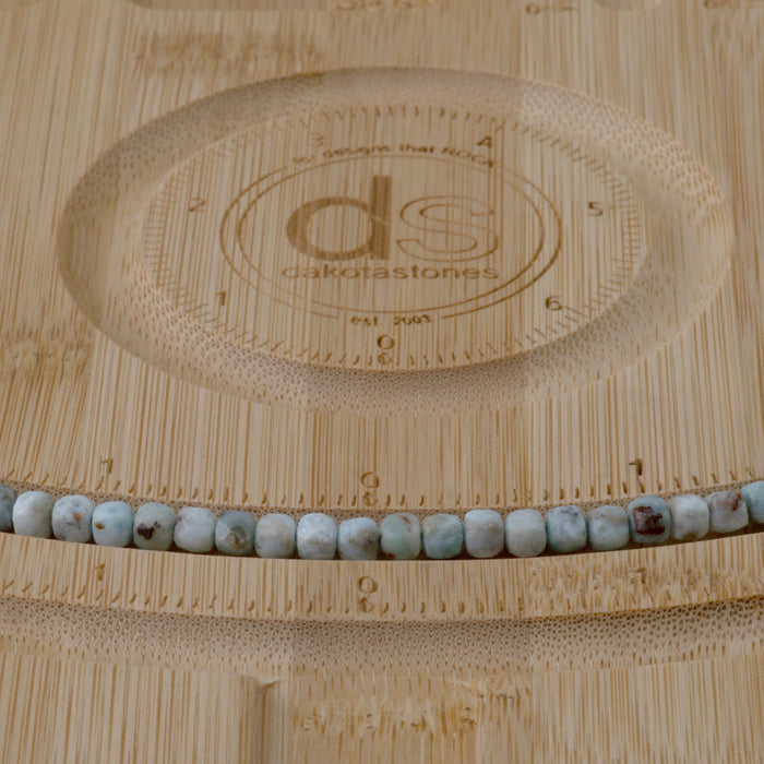 This is a Dakota Stones 4mm Larimar Gemstone strand with A grade faceted cube beads in 15-16 inch strand.