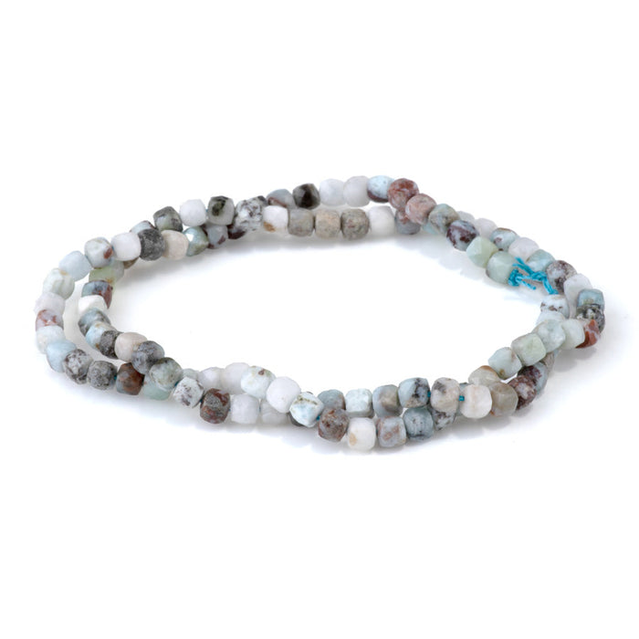 This is a Dakota Stones 4mm Larimar Matrix Gemstone strand with faceted cube beads in 15-16 inch strand.