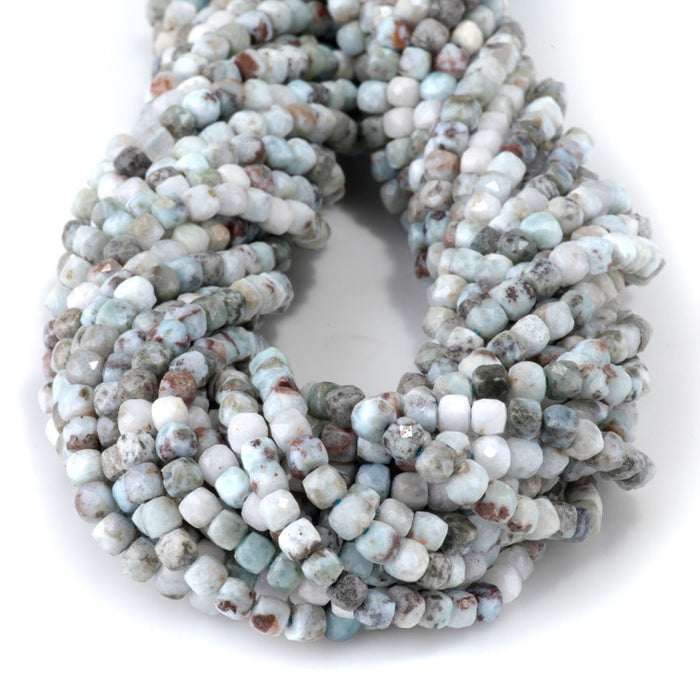 This is a Dakota Stones 4mm Larimar Matrix Gemstone strand with faceted cube beads in 15-16 inch strand.