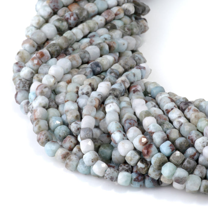 This is a Dakota Stones 4mm Larimar Matrix Gemstone strand with faceted cube beads in 15-16 inch strand.