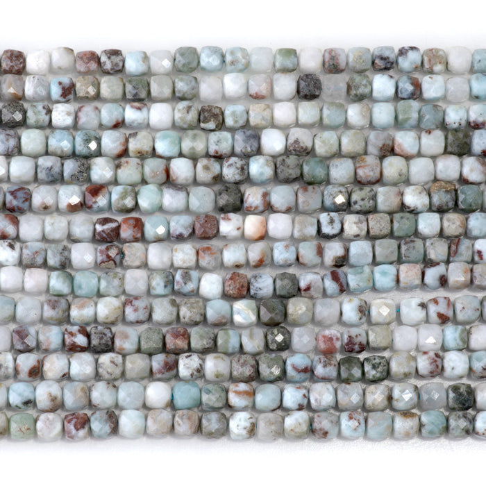 This is a Dakota Stones 4mm Larimar Matrix Gemstone strand with faceted cube beads in 15-16 inch strand.
