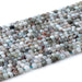 This is a Dakota Stones 4mm Larimar Matrix Gemstone strand with faceted cube beads in 15-16 inch strand.
