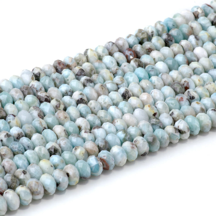 This is a Dakota Stones 5x8mm Larimar Gemstone strand with faceted rondelle beads in 15-16 inch strand.