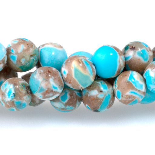 This is a Dakota Stones 6mm Magnesite Turquoise Blue Gemstone strand with dyed round beads in 15-16 inch strand.