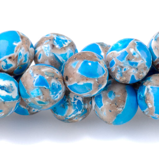 This is a Dakota Stones 8mm Magnesite Blue Gemstone strand with dyed round beads in 15-16 inch strand.