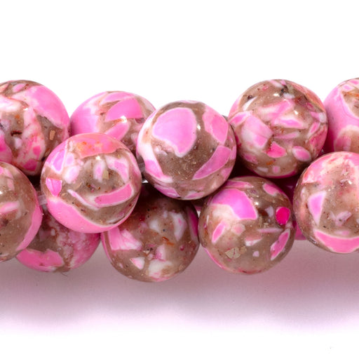 This is a Dakota Stones 8mm Magnesite Hot Pink Gemstone strand with dyed round beads in 15-16 inch strand.