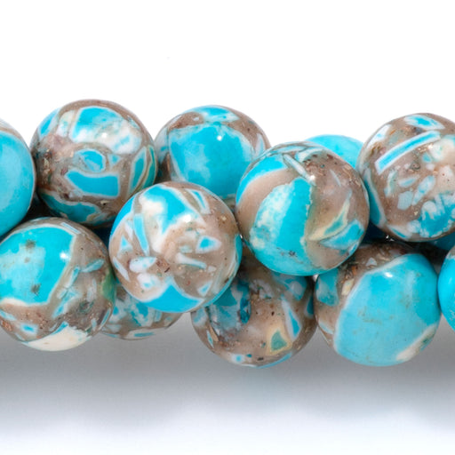 This is a Dakota Stones 8mm Magnesite Turquoise Blue Gemstone strand with dyed round beads in 15-16 inch strand.