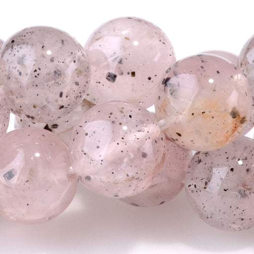 This is a Dakota Stones 10mm Pink Mica Gemstone strand with A grade round beads in 15-16 inch strand.