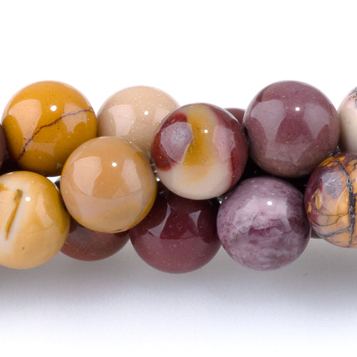 This is a Dakota Stones 8mm Mookaite Gemstone strand with round beads in 8 inch strand.