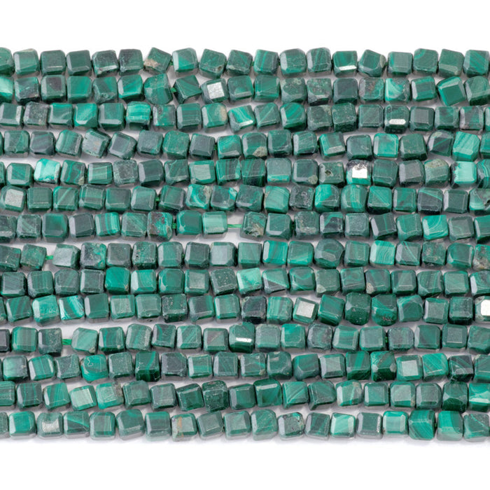 This is a Dakota Stones 4mm Malachite Gemstone strand with A grade table-cut cube beads in 15-16 inch strand.