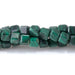 This is a Dakota Stones 4mm Malachite Gemstone strand with A grade table-cut cube beads in 15-16 inch strand.