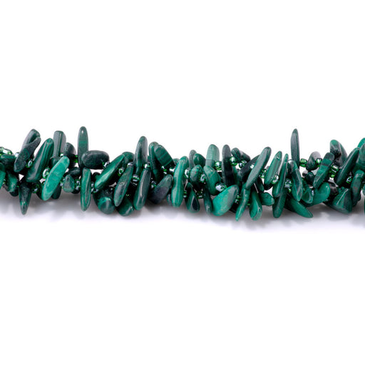 This is a Dakota Stones 5x10-20mm Malachite Top Drill Teeth Gemstone strand of round beads in 15-16 inch strand.