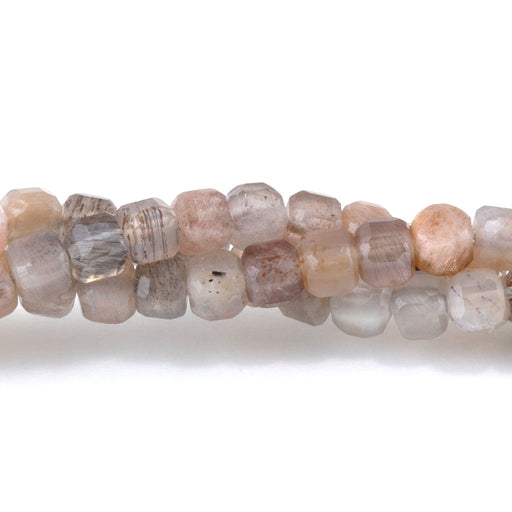 This is a Dakota Stones 3mm Mixed Moonstone Gemstone strand with table-cut cube beads in 15-16 inch strand.