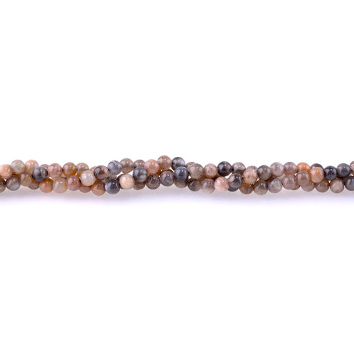 This is a Dakota Stones 4mm Mixed Moonstone Gemstone strand with round beads in 15-16 inch strand.