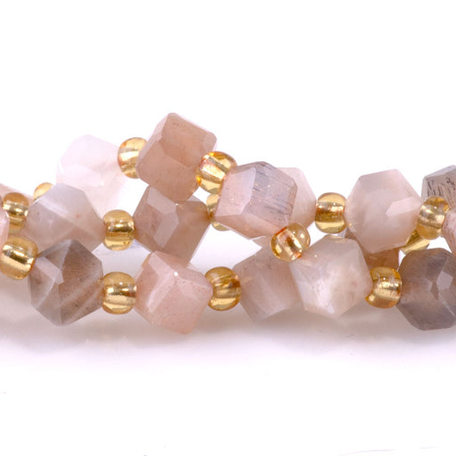 This is a Dakota Stones Rainbow Moonstone Mm Corner Gemstone strand with table-cut cube beads in 15-16 inch strand.