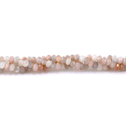 This is a Dakota Stones 4x6mm Rainbow Moonstone Large Hole Gemstone strand with natural faceted rondelle beads.