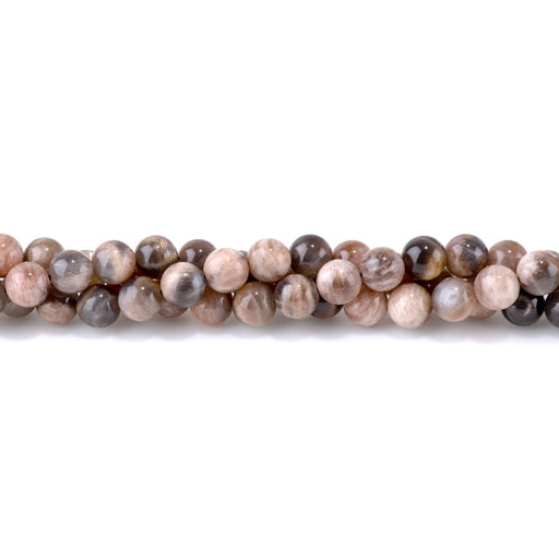 This is a Dakota Stones 8mm Moonstone Mixed Gemstone strand with round beads in 15-16 inch strand.