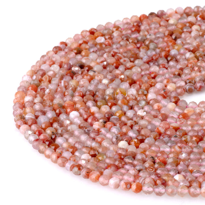 This is a Dakota Stones 4mm Morocco Red Agate Microfaceted Gemstone strand with round beads in 15-16 inch strand.