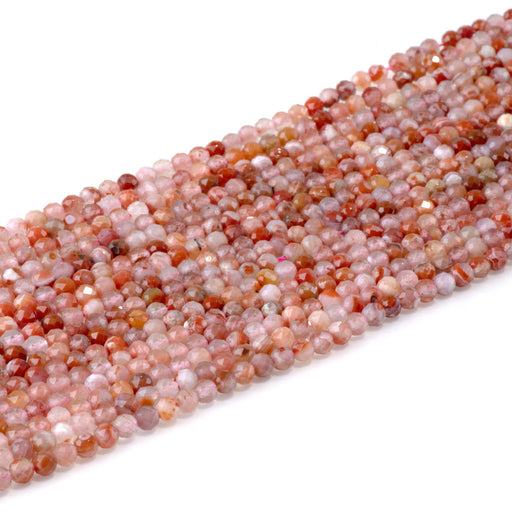 This is a Dakota Stones 4mm Morocco Red Agate Microfaceted Gemstone strand with round beads in 15-16 inch strand.