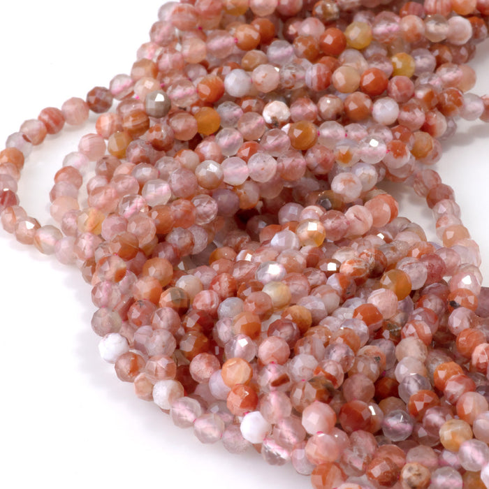 This is a Dakota Stones 4mm Morocco Red Agate Microfaceted Gemstone strand with round beads in 15-16 inch strand.