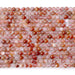 This is a Dakota Stones 4mm Morocco Red Agate Microfaceted Gemstone strand with round beads in 15-16 inch strand.
