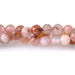 This is a Dakota Stones 4mm Morocco Red Agate Microfaceted Gemstone strand with round beads in 15-16 inch strand.