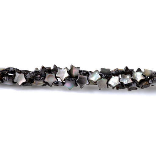 This is a Dakota Stones 10mm Mother of Pearl Puff Black Gemstone strand with star beads in 15-16 inch strand.