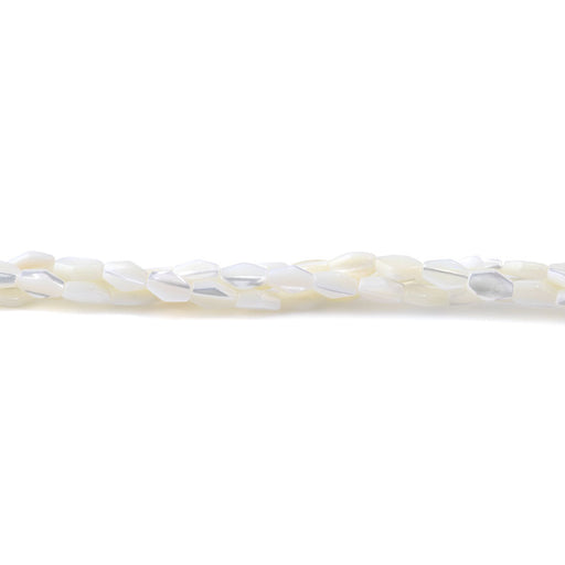 This is a Dakota Stones 10x5mm Mother of Pearl Flat Rice Gemstone strand with faceted beads in 15-16 inch strand.
