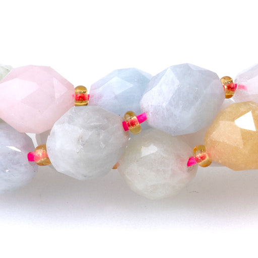 This is a Dakota Stones 6x8mm Morganite Triangle Cut Rice Gemstone strand with faceted beads in 15-16 inch strand.