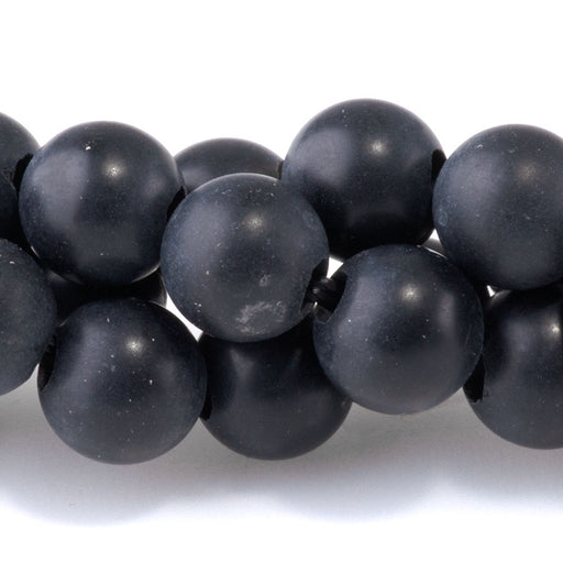 This is a Dakota Stones 8mm Onyx Large Hole Gemstone strand with matte round beads in 8 inch strand.