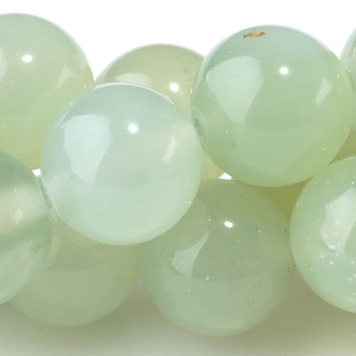 This is a Dakota Stones 12mm New Jade Gemstone strand with round beads in 8 inch strand.