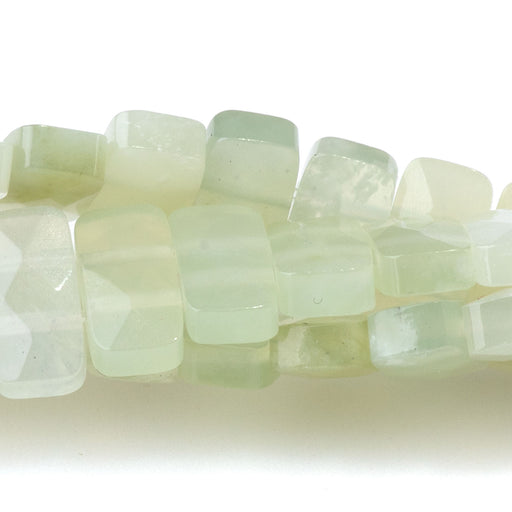 This is a Dakota Stones 5x10mm New Jade Double Drill Gemstone strand of round beads in 8 inch strand.