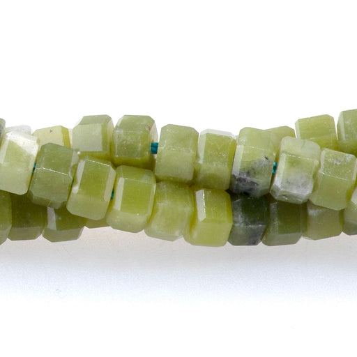 This is a Dakota Stones 6mm New Jade Hexagon Gemstone strand of round beads in 15-16 inch strand.