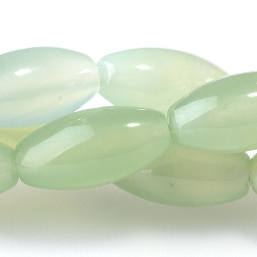 This is a Dakota Stones 8x16mm New Jade Rice Gemstone strand of round beads in 8 inch strand.