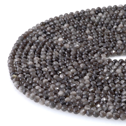 This is a Dakota Stones 4mm Silver Obsidian Microfaceted Gemstone strand with round beads in 15-16 inch strand.