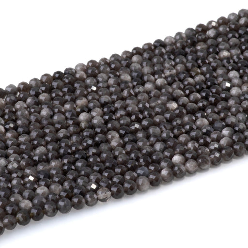 This is a Dakota Stones 4mm Silver Obsidian Microfaceted Gemstone strand with round beads in 15-16 inch strand.