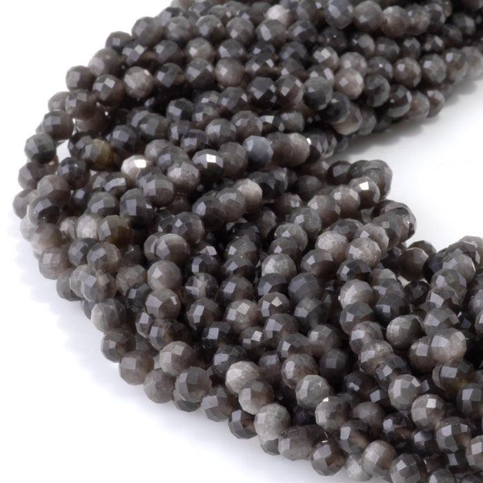 This is a Dakota Stones 4mm Silver Obsidian Microfaceted Gemstone strand with round beads in 15-16 inch strand.
