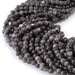 This is a Dakota Stones 4mm Silver Obsidian Microfaceted Gemstone strand with round beads in 15-16 inch strand.